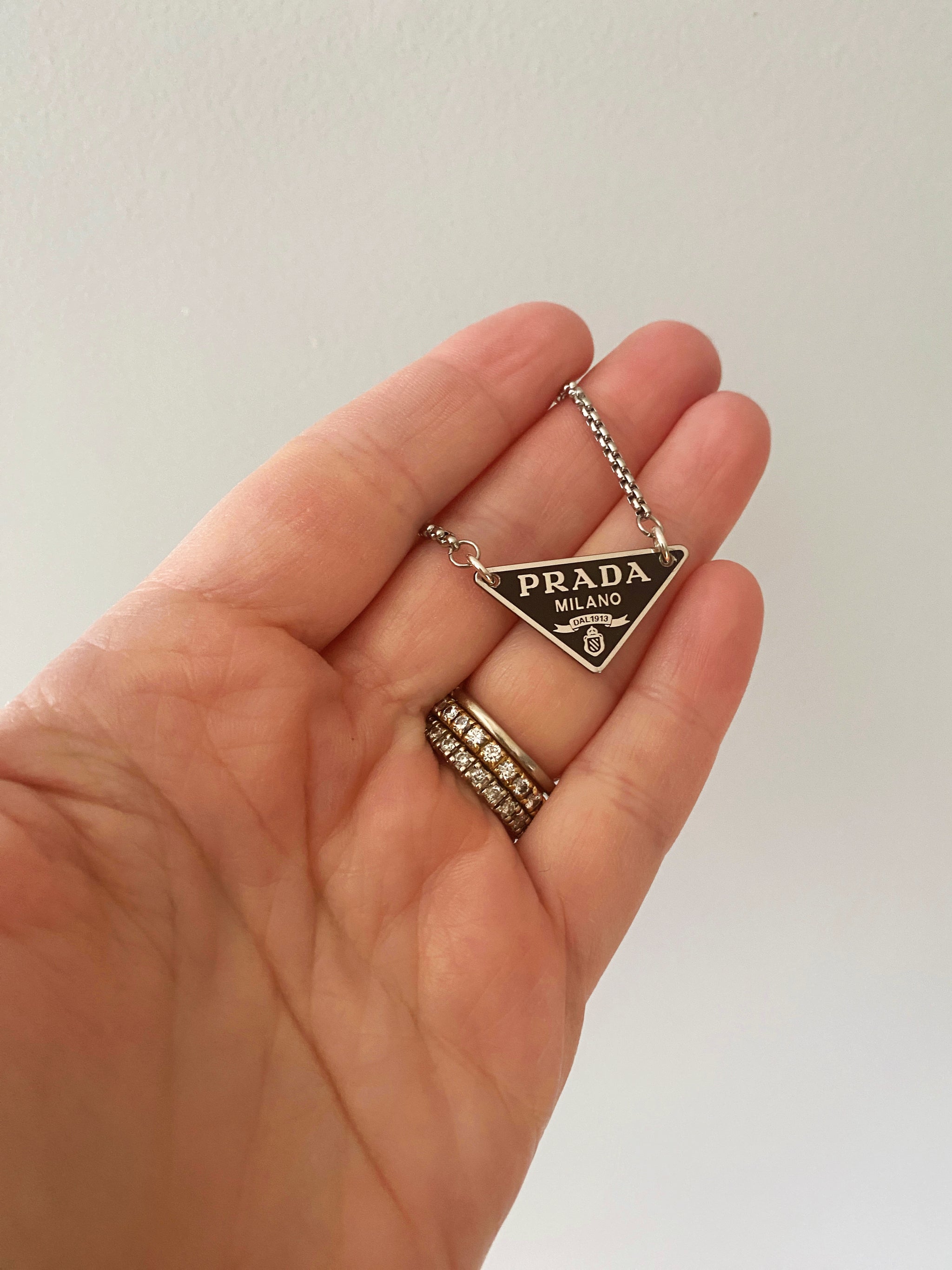 Silver and Black Triangle Prada Charm Necklace – Old Soul Vintage