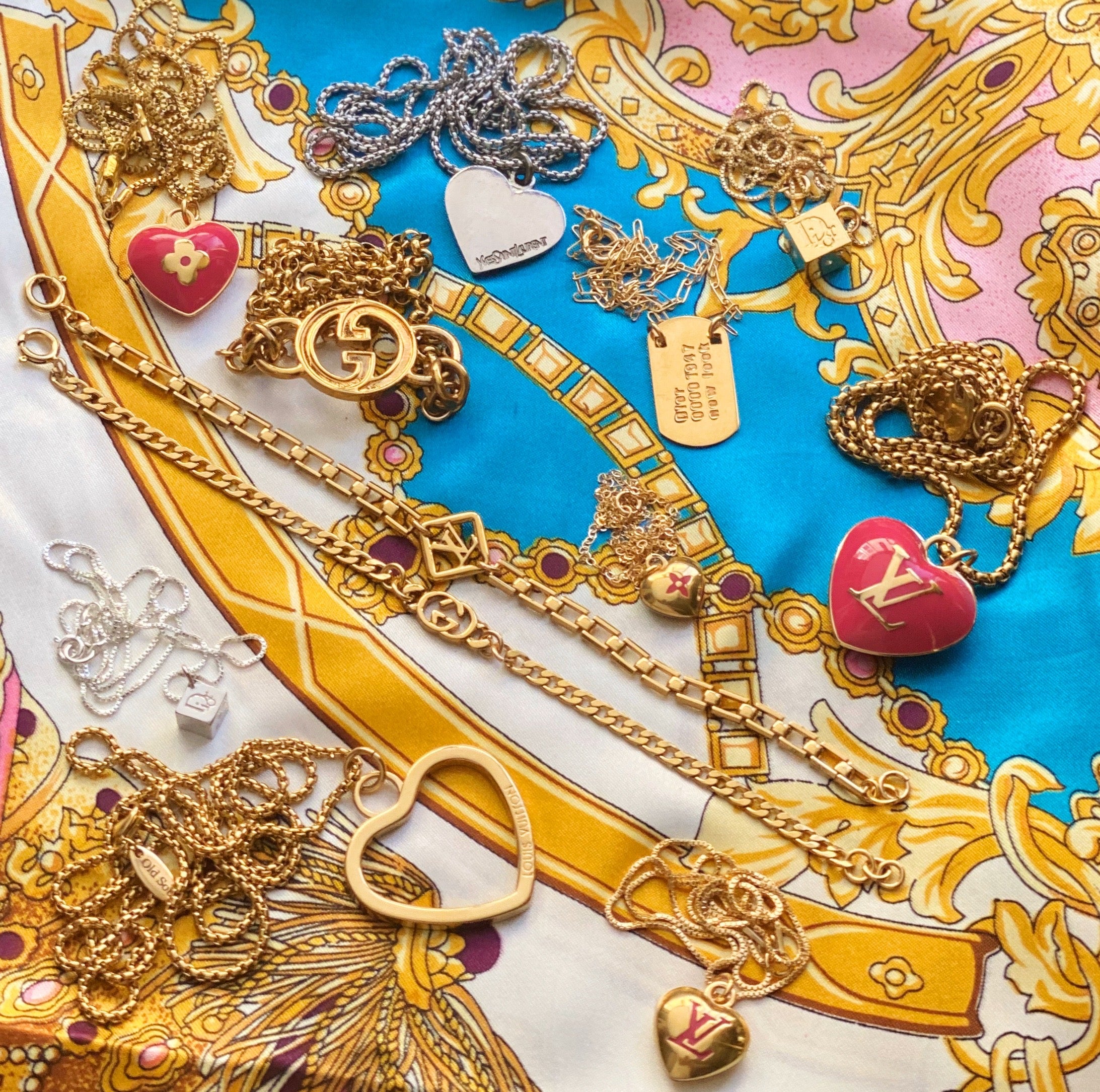 Repurposed Gold Louis Vuitton Heart Charm Vintage Bracelet –  DesignerJewelryCo