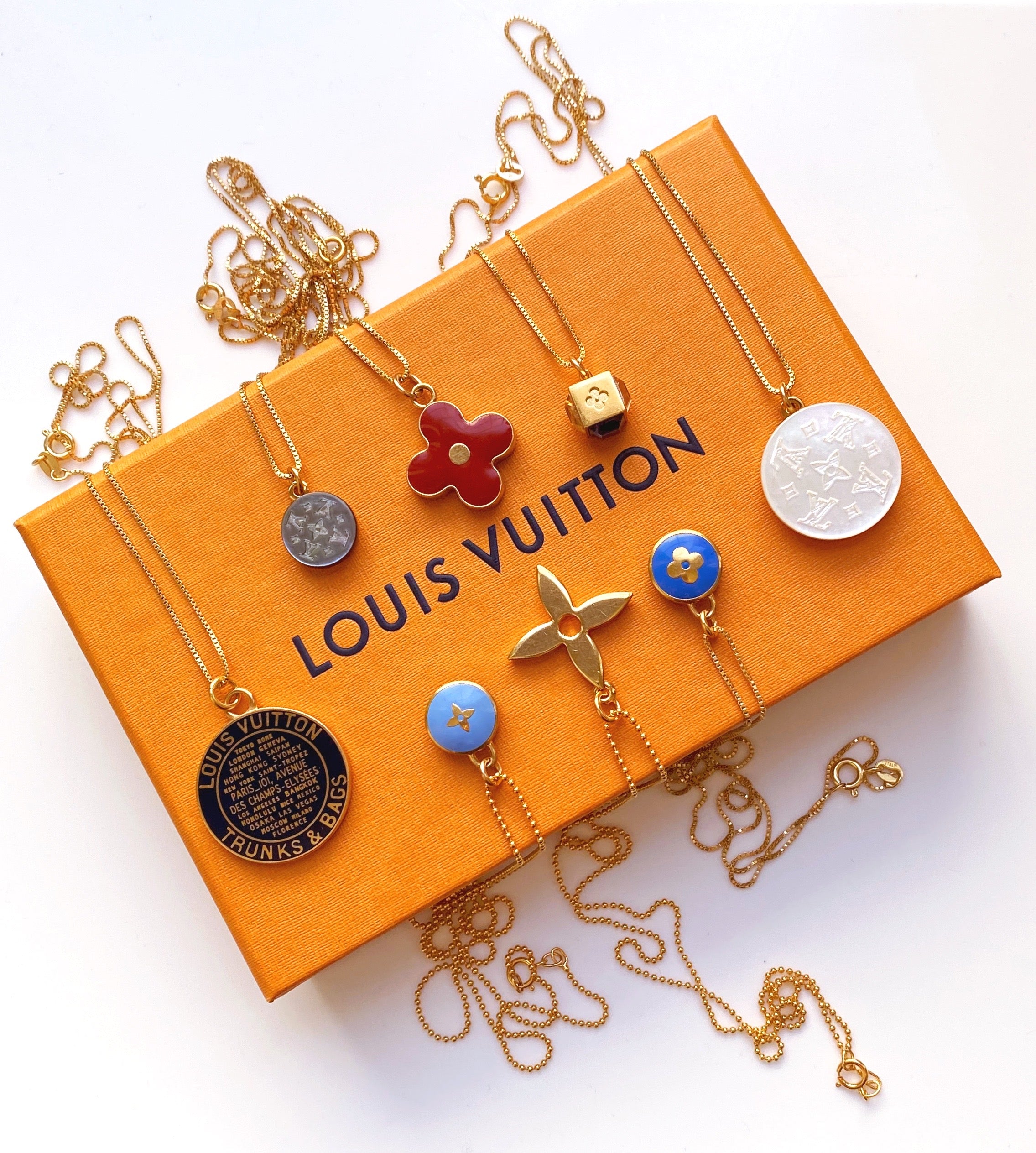 Large Vintage Blue and Gold Repurposed Louis Vuitton Charm Necklace – Old  Soul Vintage Jewelry