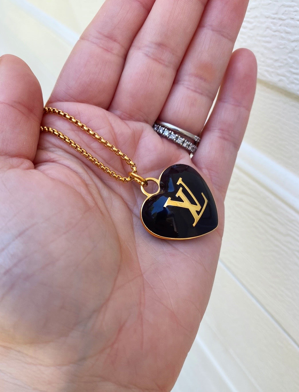 Louis Vuitton Black and Gold Charm Necklace