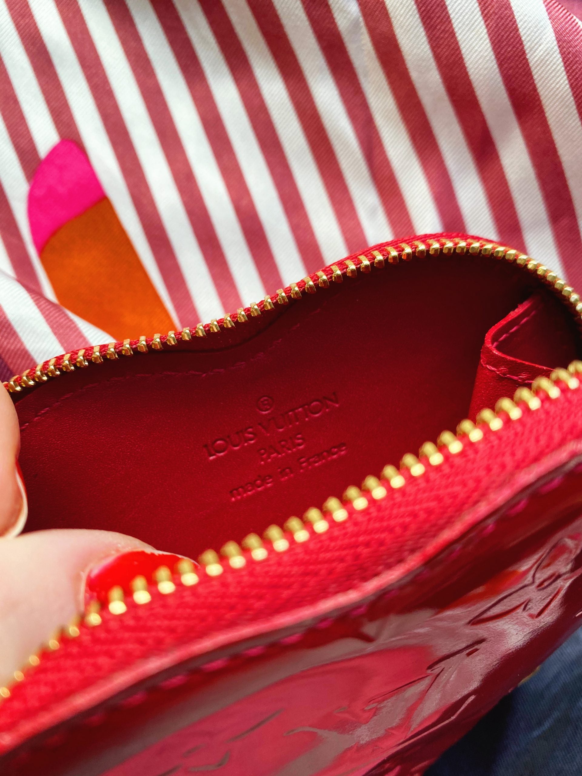 vuitton red heart shaped coin