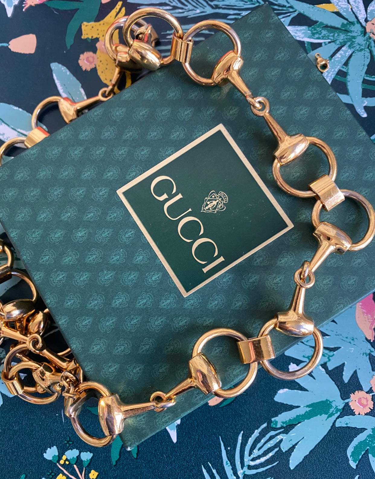 Sold at Auction: Gucci 18K Horsebit Flora Charm Bracelet